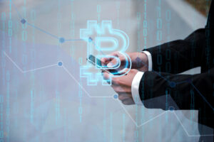 A person in a suit holding a smartphone, with a translucent Bitcoin symbol overlay and digital data in the background.