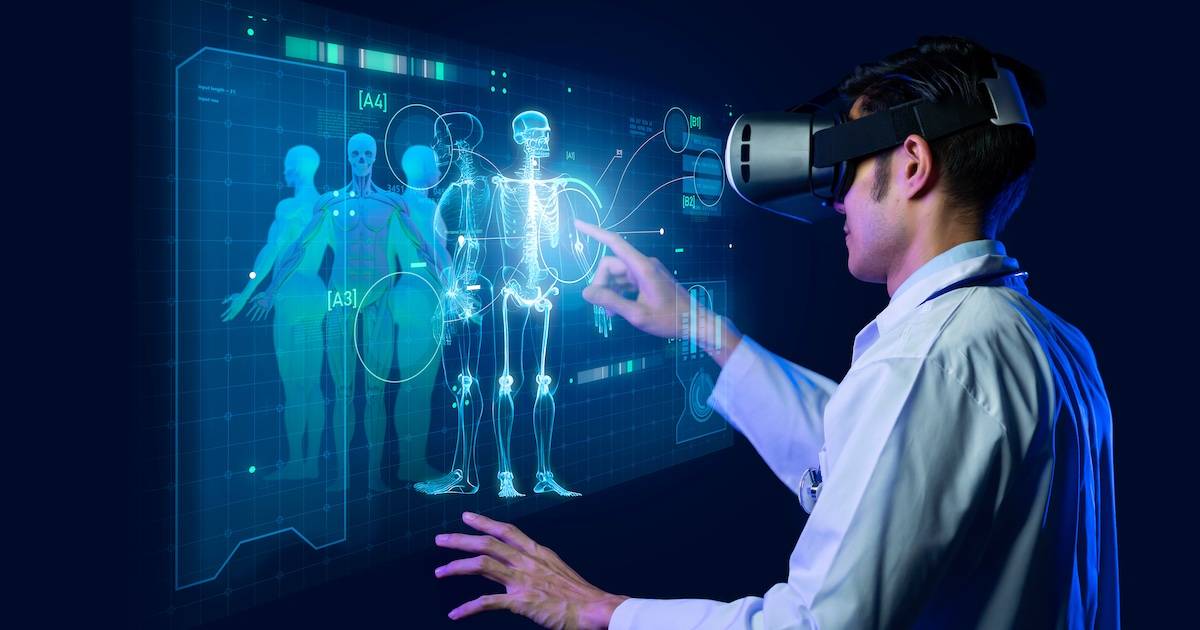 A user in a white lab coat interacts with a virtual reality display showing human anatomical models and data points in a high-tech environment.